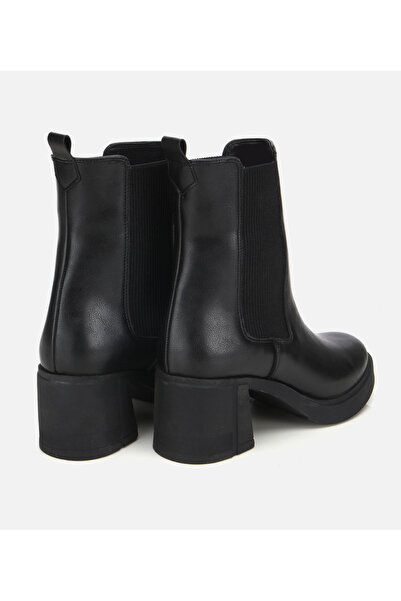 Hotiç Kadın Siyah Lastik Detaylı Tokalı Kalın Tabanlı Topuklu Bot