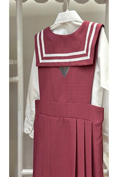 La reina petite Larina Petite pink elementary school pinafore with a white pleated shirt