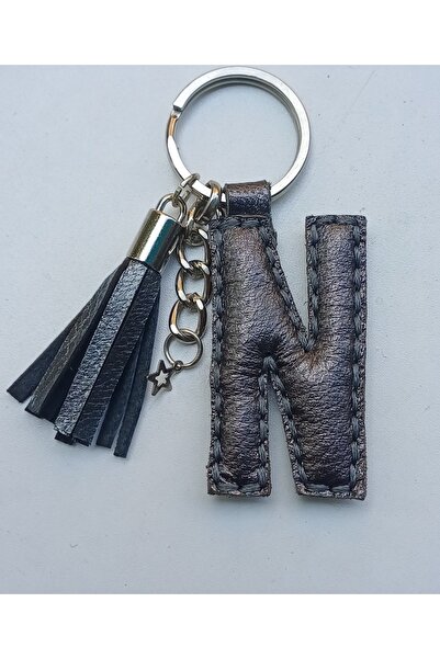 Durush Collection سلسلة مفاتيح من الجلد الطبيعي باللون الرمادي المعدني على شك...