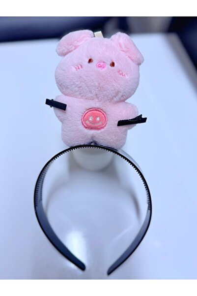 AresTokaAksesuar أرنب قطيفة يحمل قلمًا ويرتدي تاجًا