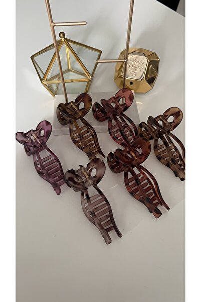 SU PERİSİ TAKI BİJUTERİ Matte Pink Leopard Print Bowknot Clip with Subtle Tone