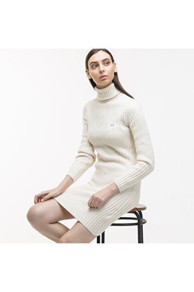 Lacoste Woman's beige turtleneck knit dress.