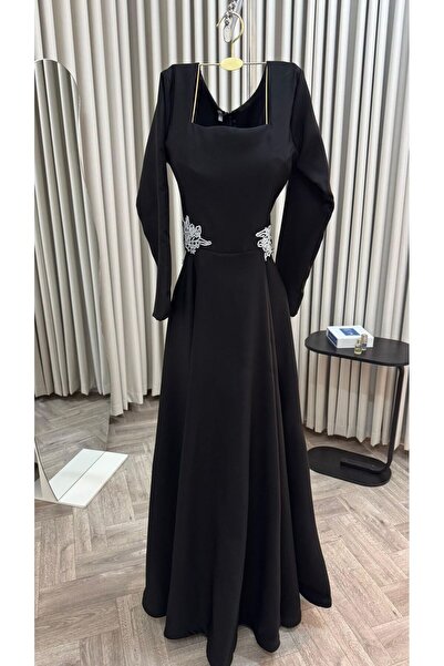 Heidi Black dress with embroidered detailing at the waist