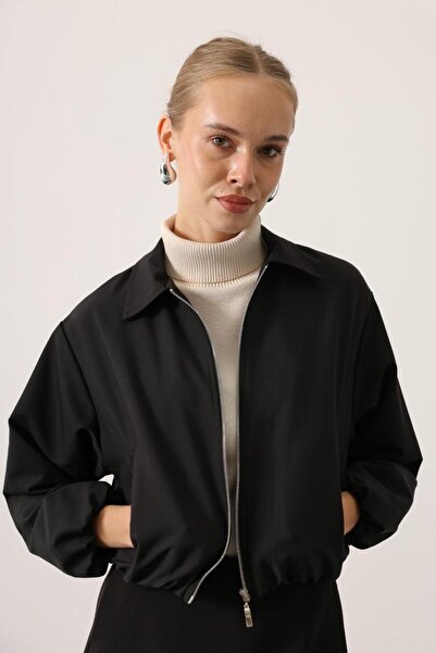 M&S moda evi Reyon Bought a Black Rubberized Jacket.