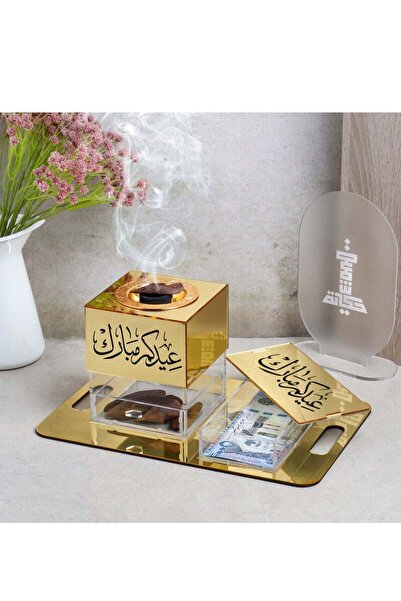 Story of candle مبخرة مع صندوق بخور مع صينية تحملهما تأتي بعبارة "عيدكم مبارك...