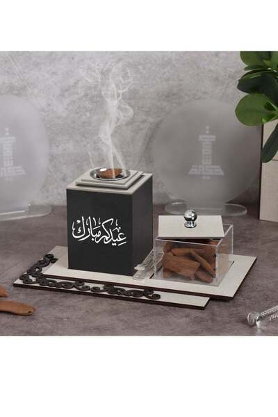 Story of candle مبخرة مع صندوق بخور مع صينية تحملهما تأتي بعبارة "عيدكم مبارك...