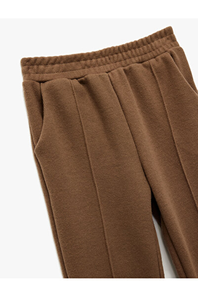 Koton Carrot Cut Pants with Elastic Waist and Pockets