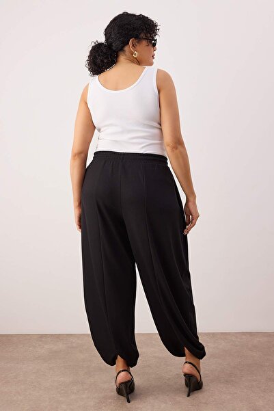 Trendyol Curve Black Pleated Plus Size Sweatpants with Elasticated Cuffs Tbbaw26Aj00014