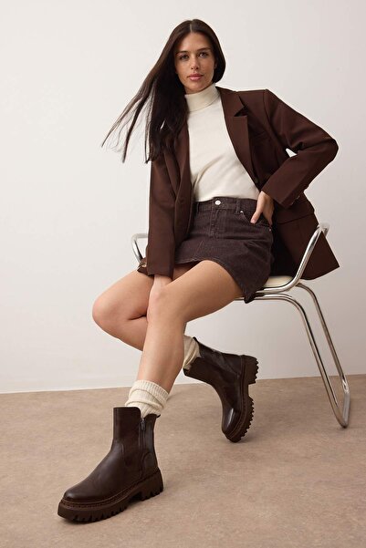 TRENDYOL SHOES Μπότες Chelsea με επένδυση από γούνα σε σκούρο καφέ χρώμα TAKAW26BO00056