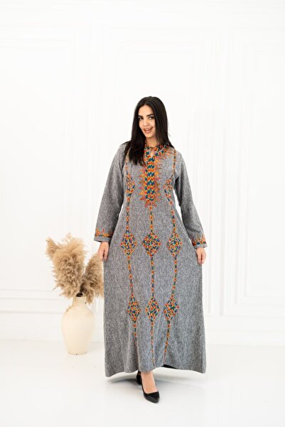 AFandina A natural wool jalabiya that combines luxury with an authentic heritage touch A-191