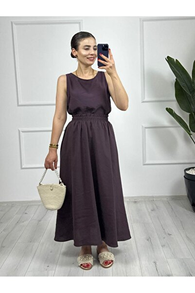 TUNAM BUTİK بدلة أيروبين من قماش الكتان فائقة النعومة مع تنورة باللون الأرجواني