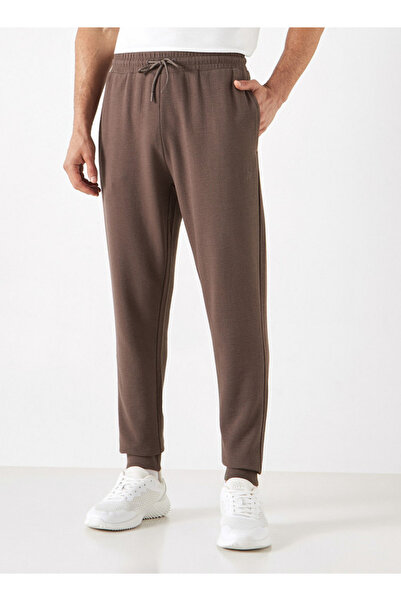 Adot Textured Joggers with Drawstring Closure and Pockets