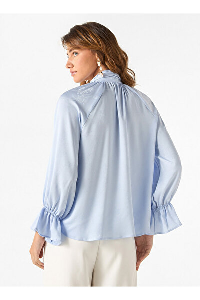Iconic Textured Top With Tie-neck And Flounce Sleeves