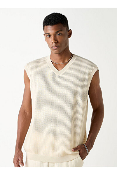 Iconic سترة ذات رقبة على شكل حرف V