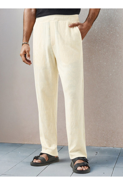 Iconic بنطلون بقصّة عادية ومحكم مع حزام خصر مطاطي وجيوب