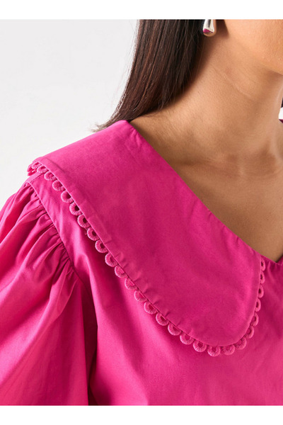 Iconic Solid Peplum Top With Peter Pan Collar And Tie-up Detail