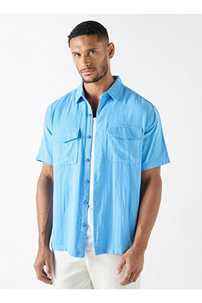 Iconic قميص منقوش بأكمام قصيرة وجيوب أمامية