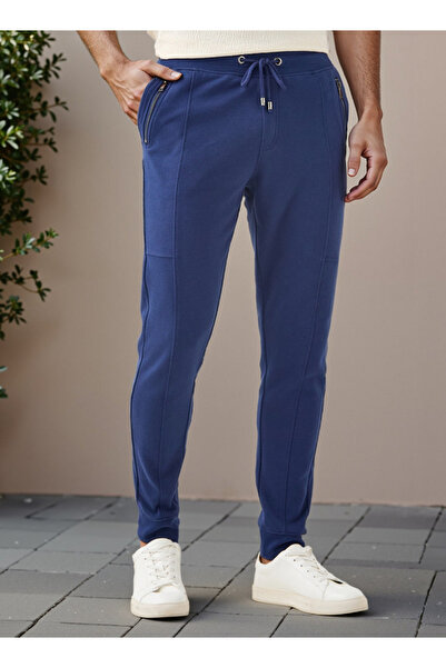 Iconic بنطال رياضي بقصّة Slim Fit مع رباط إغلاق وجيوب