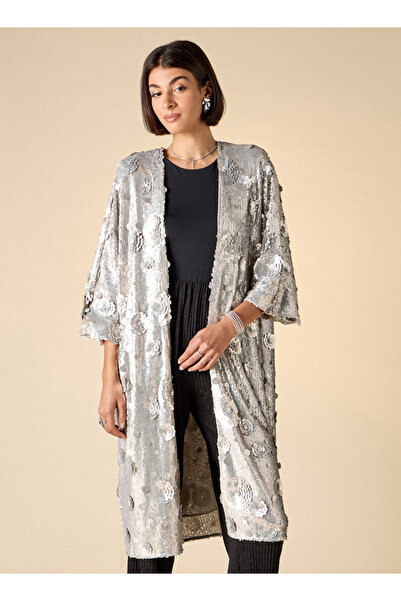 Iconic فستان قصير مفتوح من الأمام ومزين بالترتر