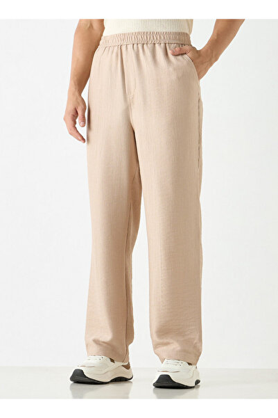 Iconic Textured Relaxed Fit Pants With Flexi Waist And Pockets