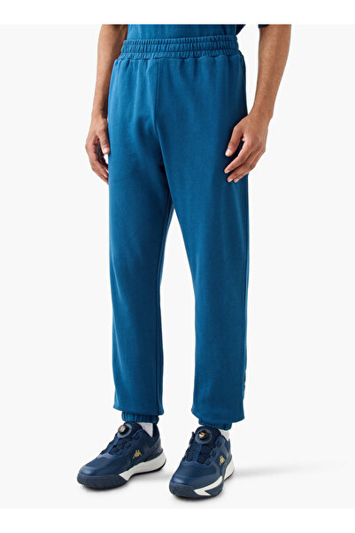 Kappa بنطال رياضي مطرز بشعار كابا مع تفاصيل حواف وجيوب