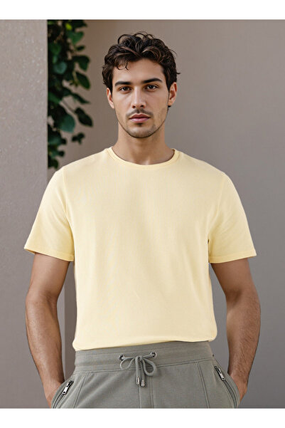 Iconic تي شيرت بقصّة عادية ومُنسّق بنقشة الفشار