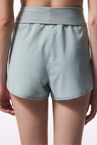 Penti Hellgrüne, gefaltete Badeshorts