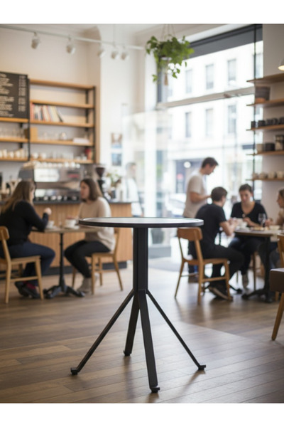 BEC13 Round black metal serving table with a modern design