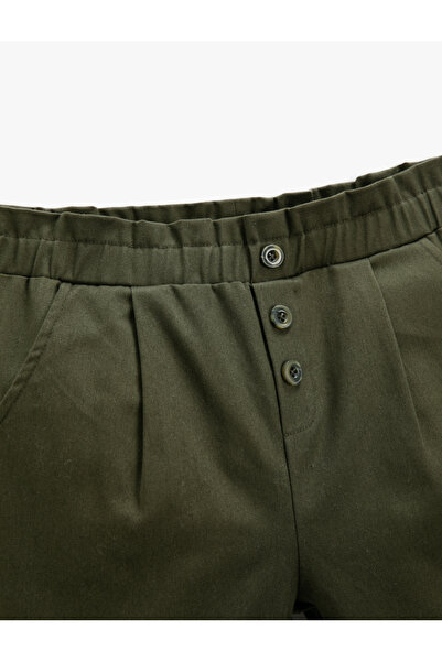 Koton Látkové mrkvové kalhoty s knoflíkem a kapsami