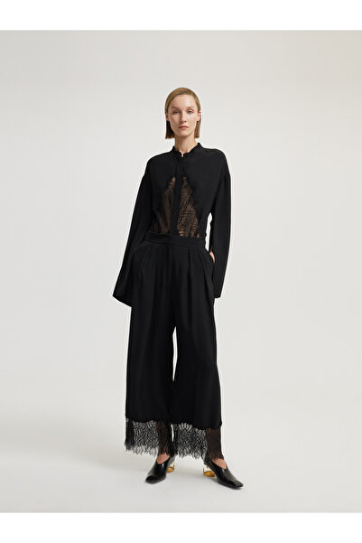 BAQA بنطلون أسود مع تفاصيل الدانتيل الساق