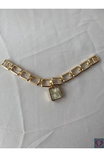 uyguntakıaksesuar ساعة يد نسائية ذات سوار ذهبي وقرص مستطيل الشكل - ساعة أنيقة...