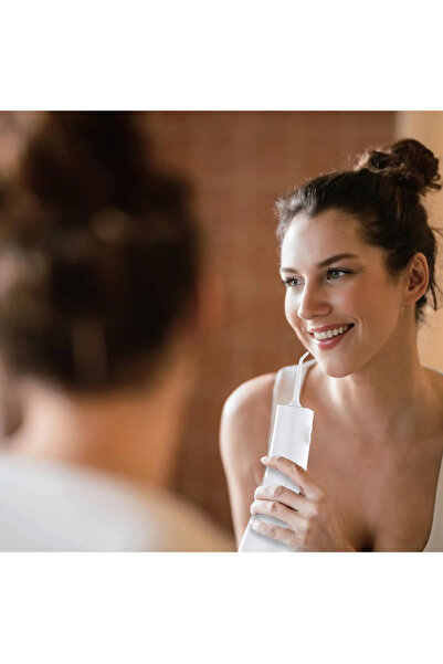 Green Lion جهاز ري فموي محمول 300 مل - أبيض