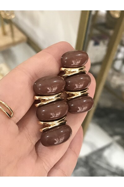 the ASEL İNCİ أقراط موديل متسلسلة ذات تفاصيل ذهبية من ماركة مكافئة للون البني