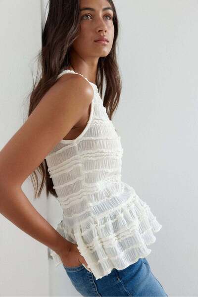 H&M بلوزة ببلوم مزينة بالكشكشة