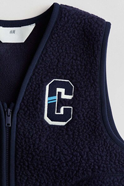 H&M Appliquéd pile gilet