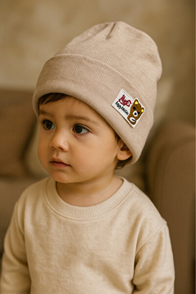 Bebelul Cream hat for children with ABC teddy bear appliqué – Comfort and style