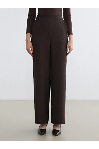 LC Waikiki بنطال نسائي واسع الساق بخصر مطاطي بني اللون من LCW Modest