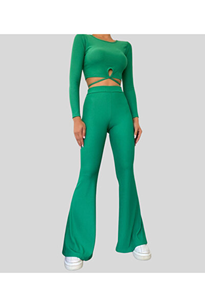 MQ Two-piece set: a long-sleeved top with a midriff cutout and wide-legged pants.