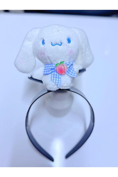 AresTokaAksesuar أرنب قطيفة يحمل قلمًا ويرتدي تاجًا