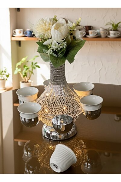 Alamtiaz A stylish steel cup holder that can hold up to 6 cups.