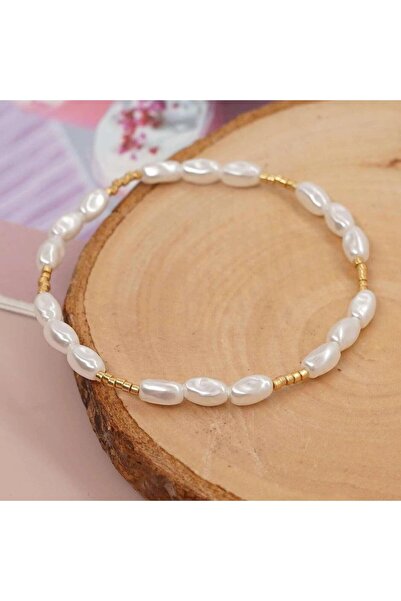 Pursehuit Golden colored, elastic, pearl bracelet, Penelope C7