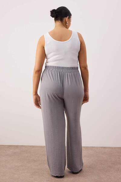 Trendyol Curve Γκρι παντελόνι με φαρδύ πόδι με ψηλόμεσο πλισέ υφαντό ύφασμα TBBSS22PL0448