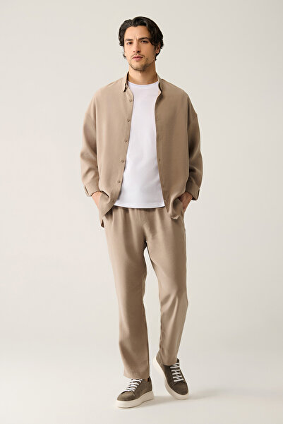 Avva Beigefarbene Soft-Touch-Hose für Herren mit Seitentaschen, elastischem Bund und entspannter Passform A41Y3031