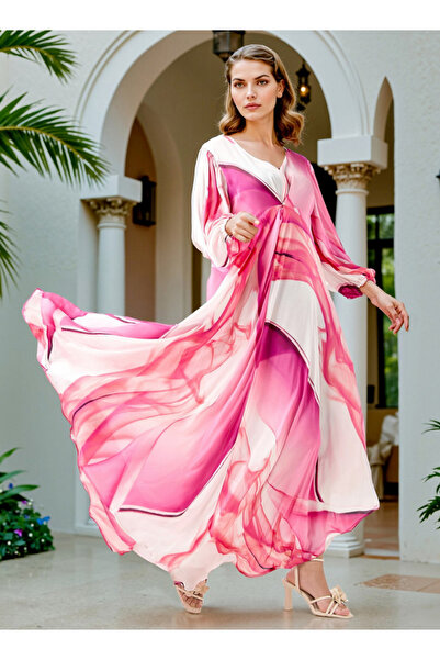 Iconic فستان ماكسي بطباعة كاملة مع حاشية غير متماثلة وأكمام طويلة