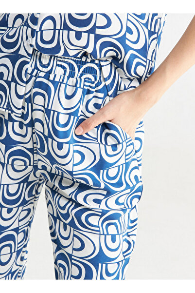 FAV All-over Print Wide Leg Pants With Elasticated Waistband And Pockets