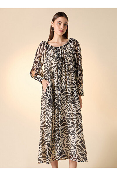 Iconic فستان ترابيز مطبوع أيقوني بأكمام طويلة