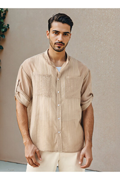 Iconic قميص ماندرين منسوج بأكمام 3/4 وجيوب على الصدر