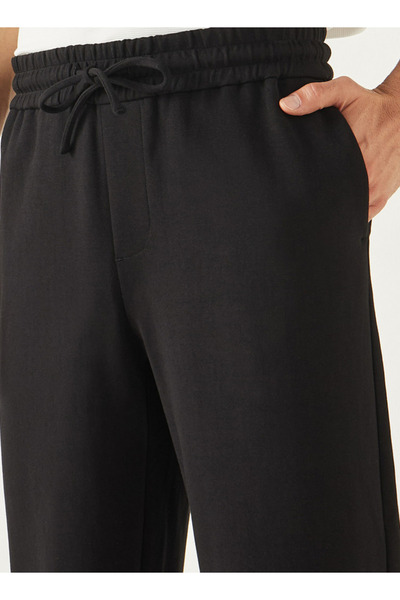 Iconic Solid Regular Fit Flexi Waist Joggers with Pockets