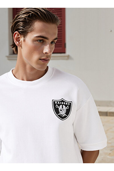 SP Characters تي شيرت NFL مطبوع برقبة دائرية وأكمام قصيرة