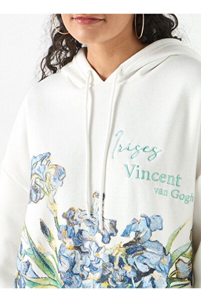 SP Characters سويت شيرت بغطاء رأس كبير الحجم بطبعة زهور وأكمام طويلة